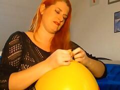Angel Eyes video 'This Redhead Mature Have A Balloon Fetish'